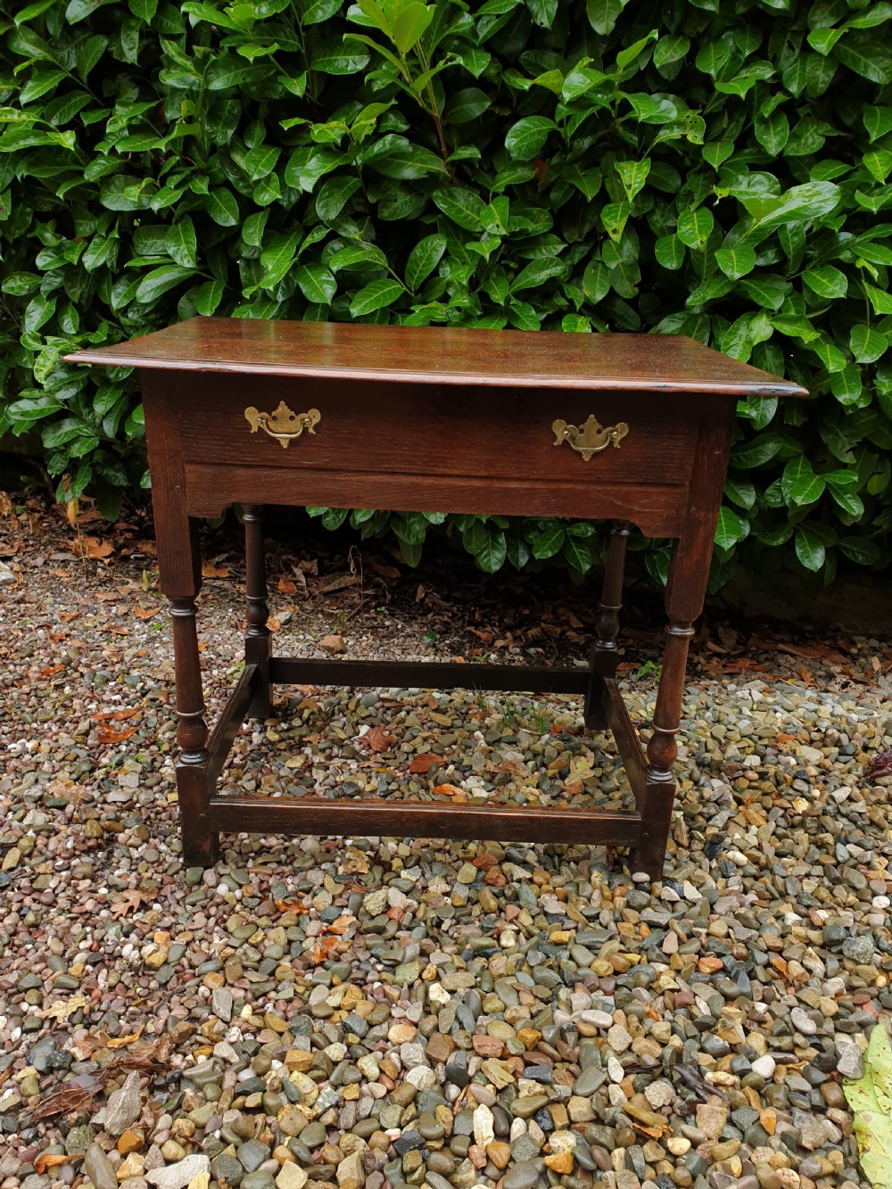 an 18thc oak single drawer welsh side table