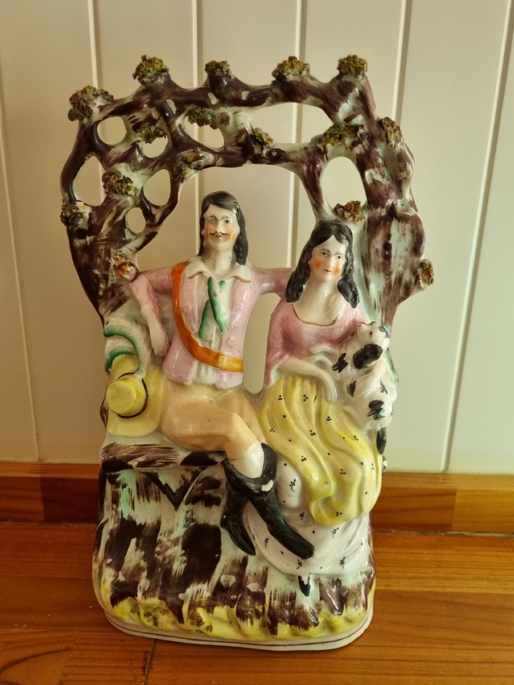 19th century colourful staffordshire figure of a courting couple with dog