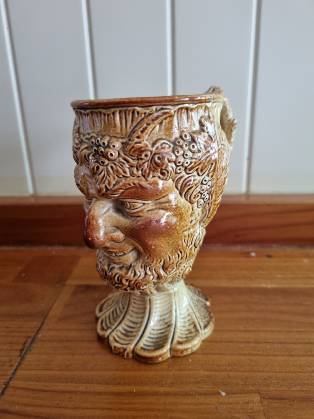 a good 19thc briddon bacchus face stoneware mug
