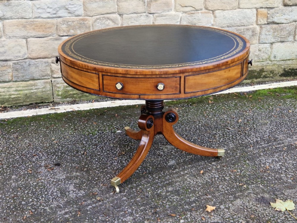 a good georgian round drum table mahogany and ebony