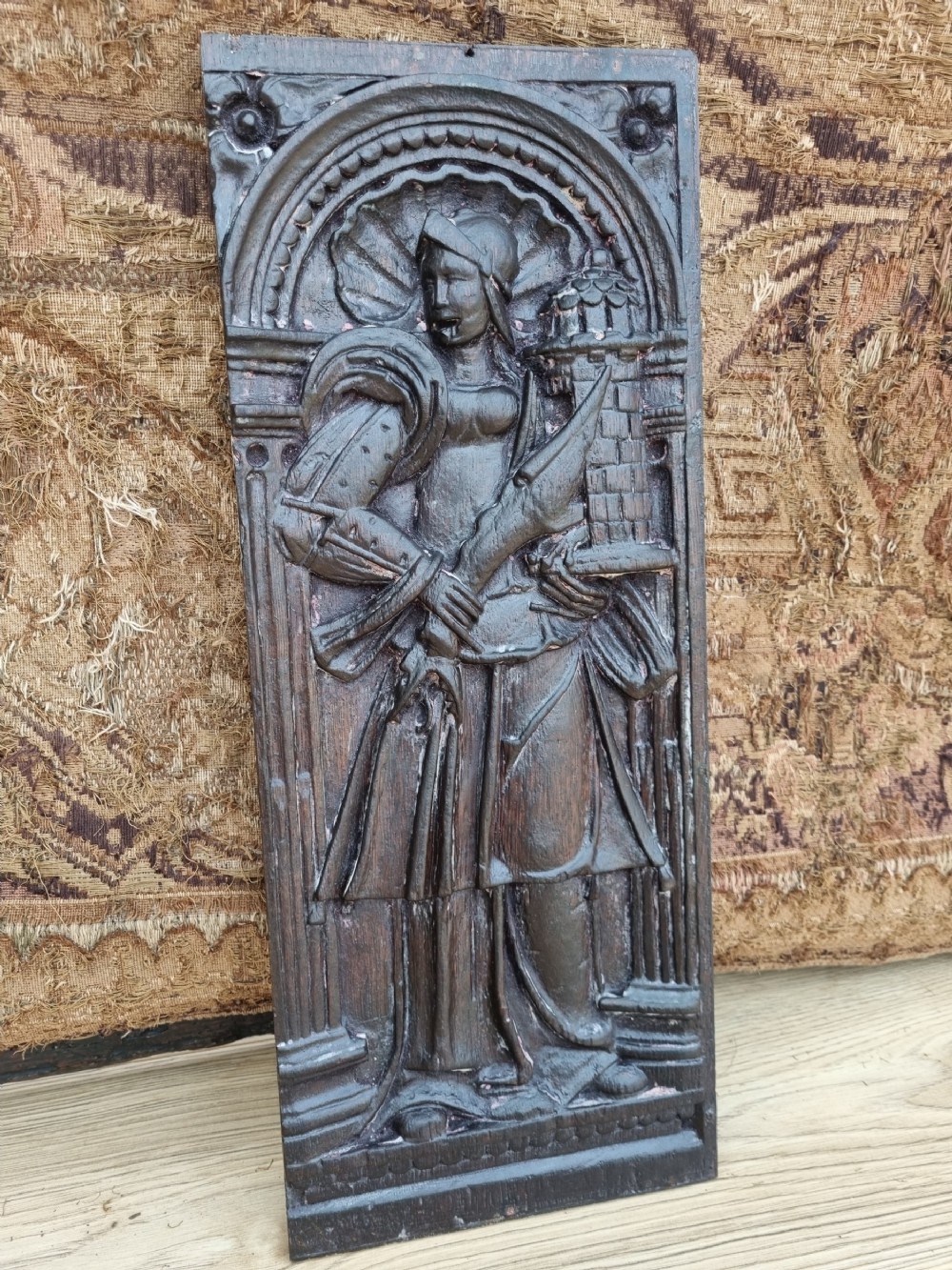 a late 16thce17thc oak panel of a knight