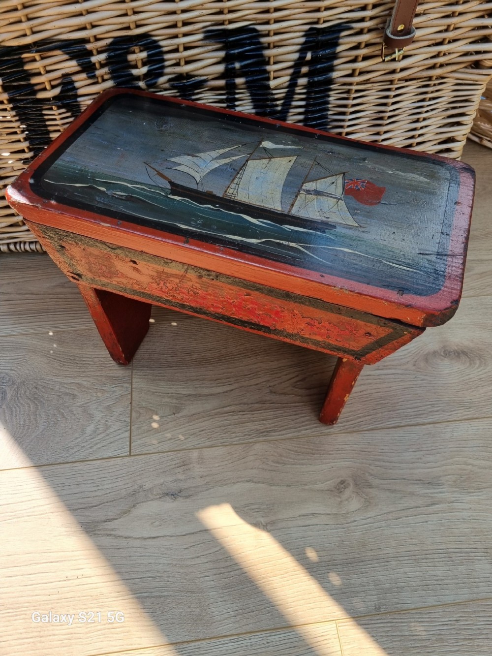 19thc primitive painted stool featuring a saling ship