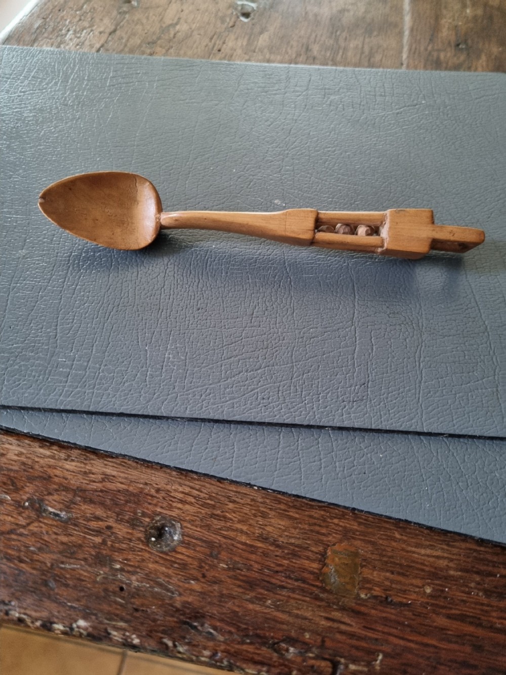 a small antique sycamore welsh love spoon