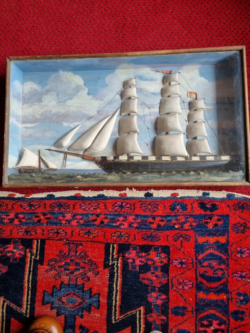 a large antique naive wooden diarama of a british sailing ship