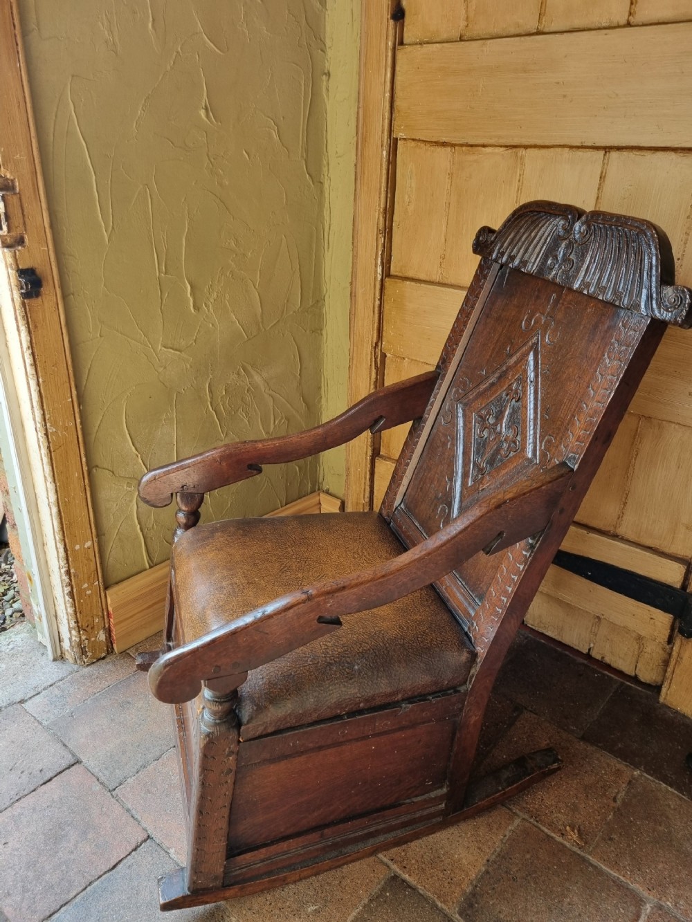 large 17thc yorkshire carved oak rocking armchair c1680