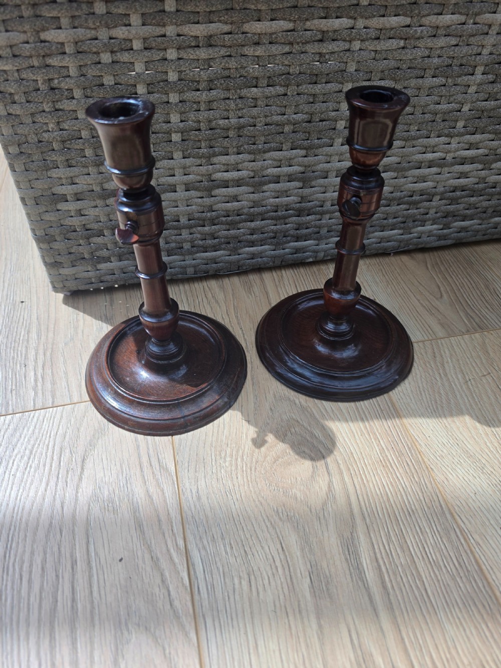 pair of rare georgian yew wood adjustable candlesticks